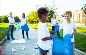 kids helping clean up the surrounding community