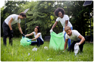 Group pf folks cleaning up litter in a park.